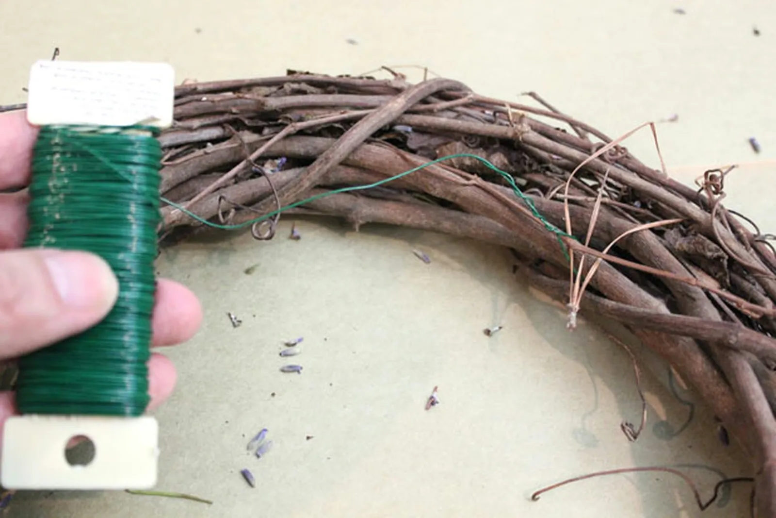 Tie paddle wire to the wreath form.
