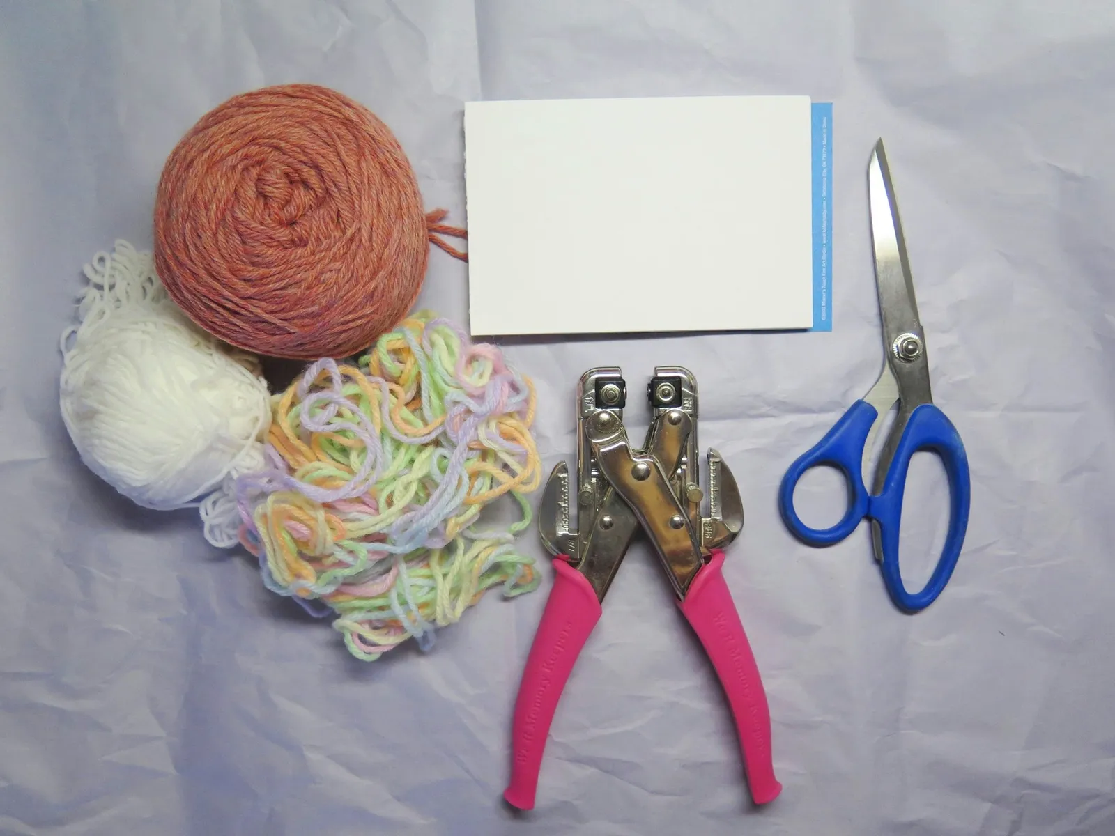 Materials you need to make a pompom bookmark