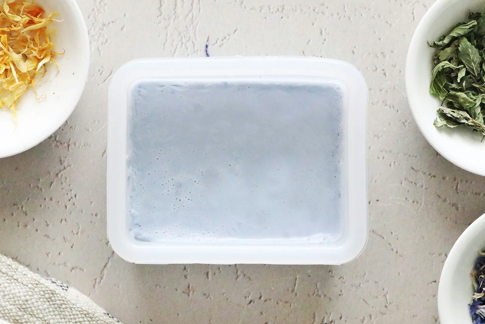 Light blue soap in a mold
