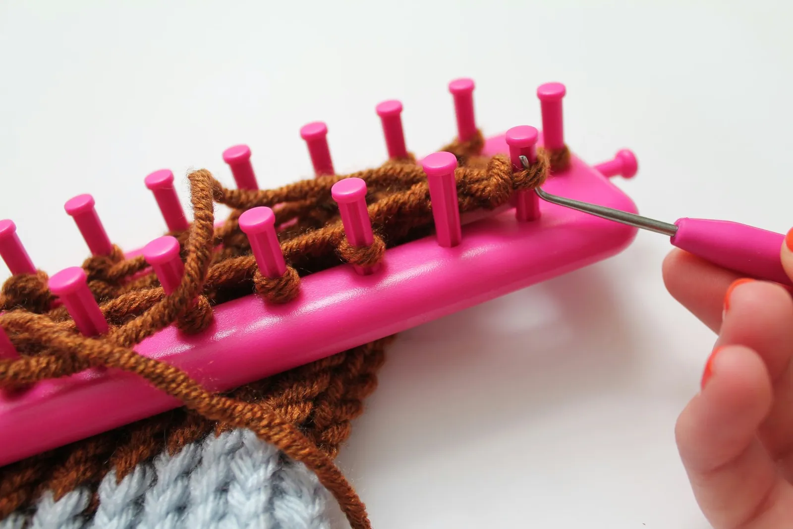Binding off of the loom.