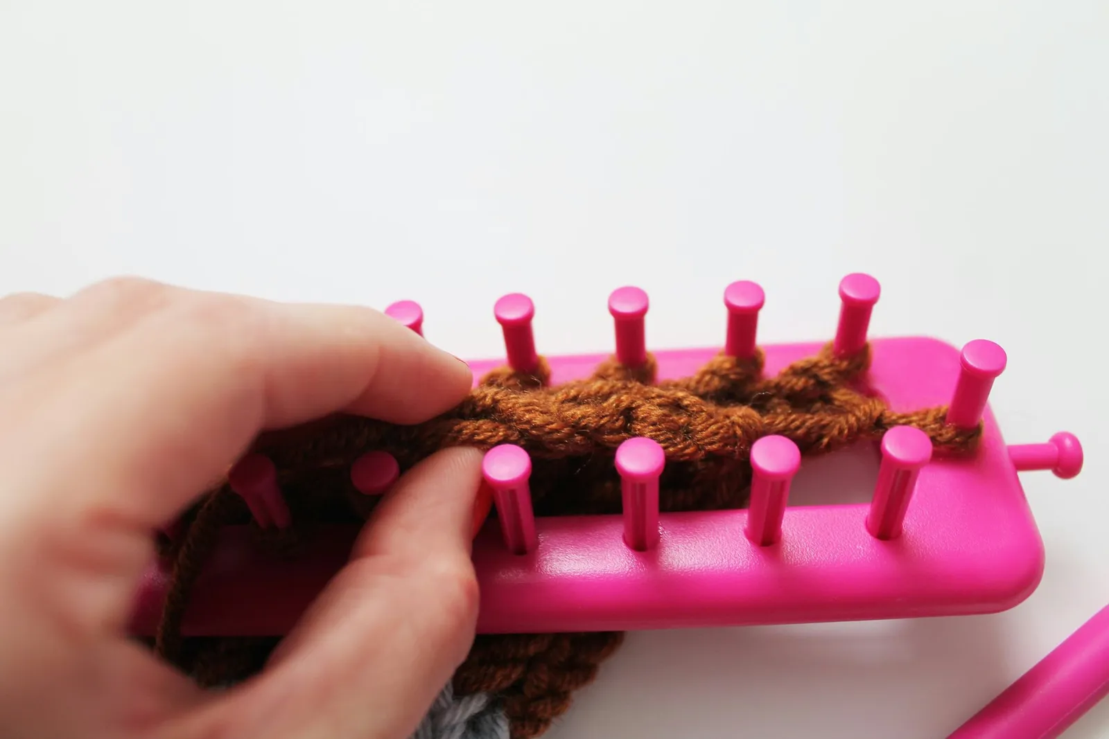 Binding off of the loom.