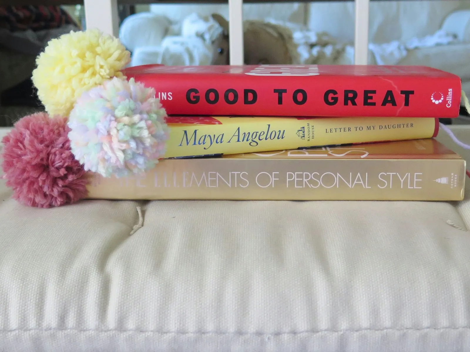 Yarn pompom bookmarks add pops of color to books