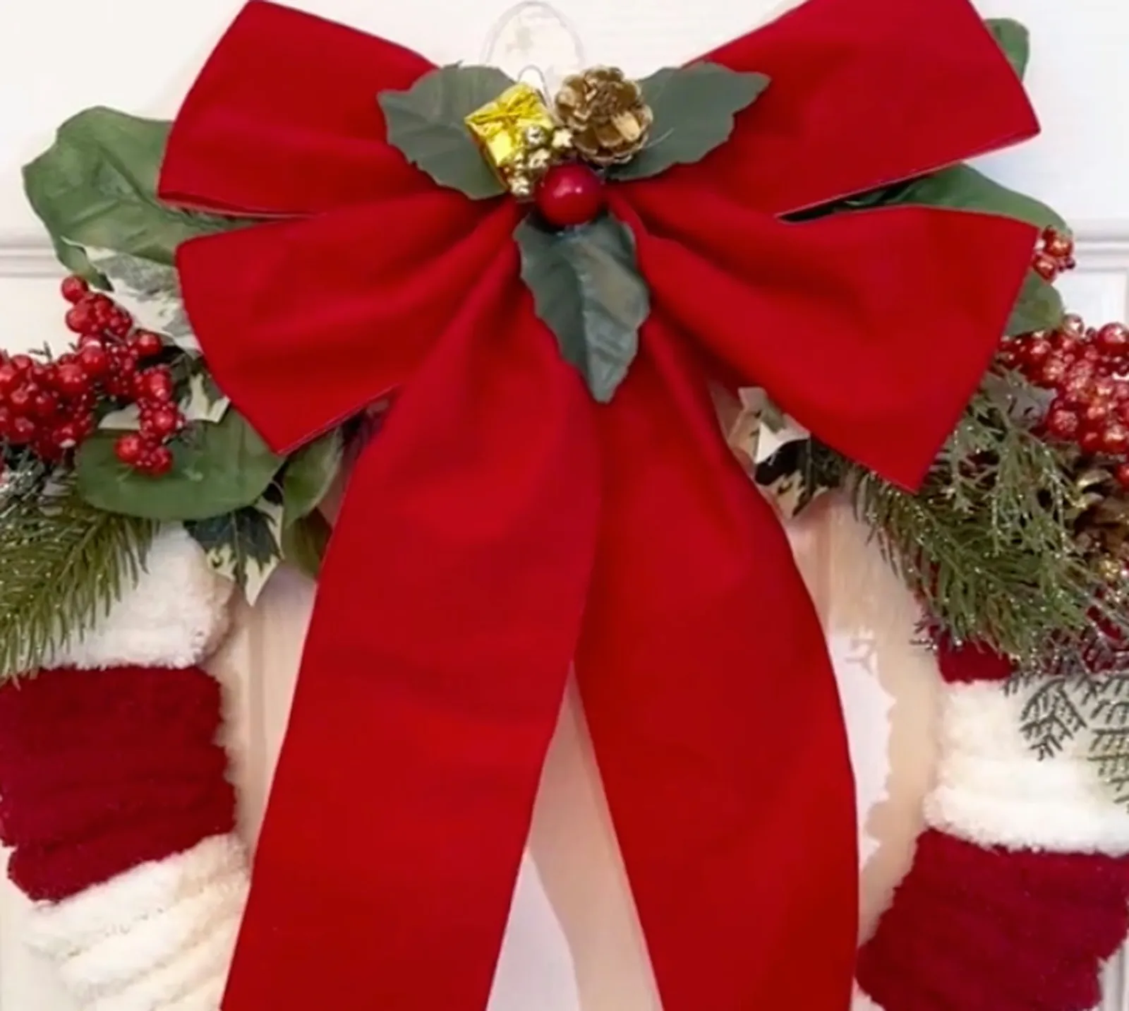 Red and white striped wreath with red bow