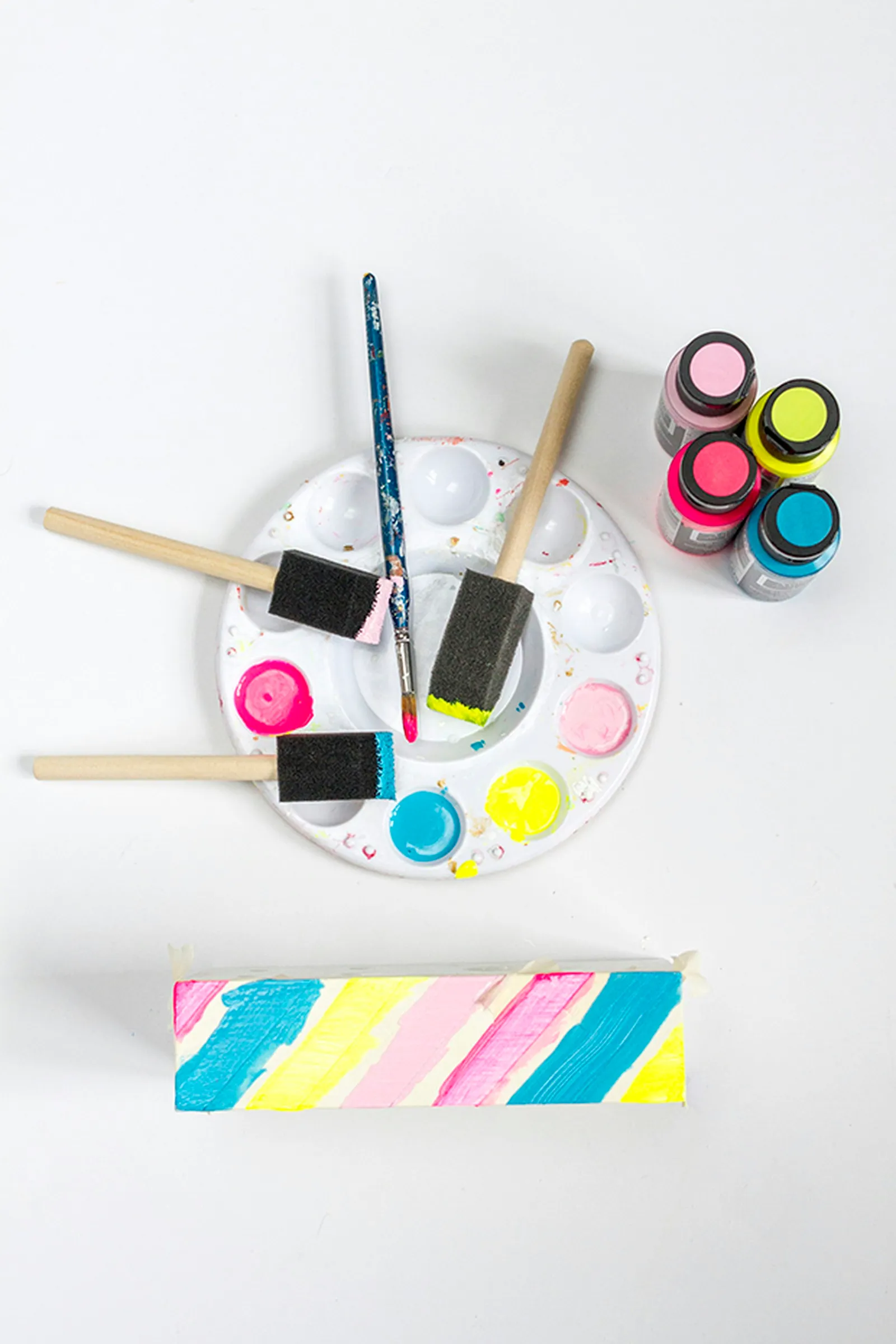 Add painted stripes in different colors to the side of the block.