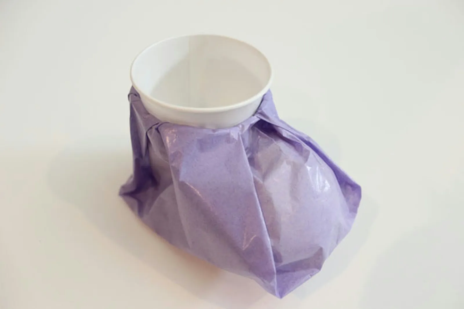 You can leave the second paper cup in place if you wish.