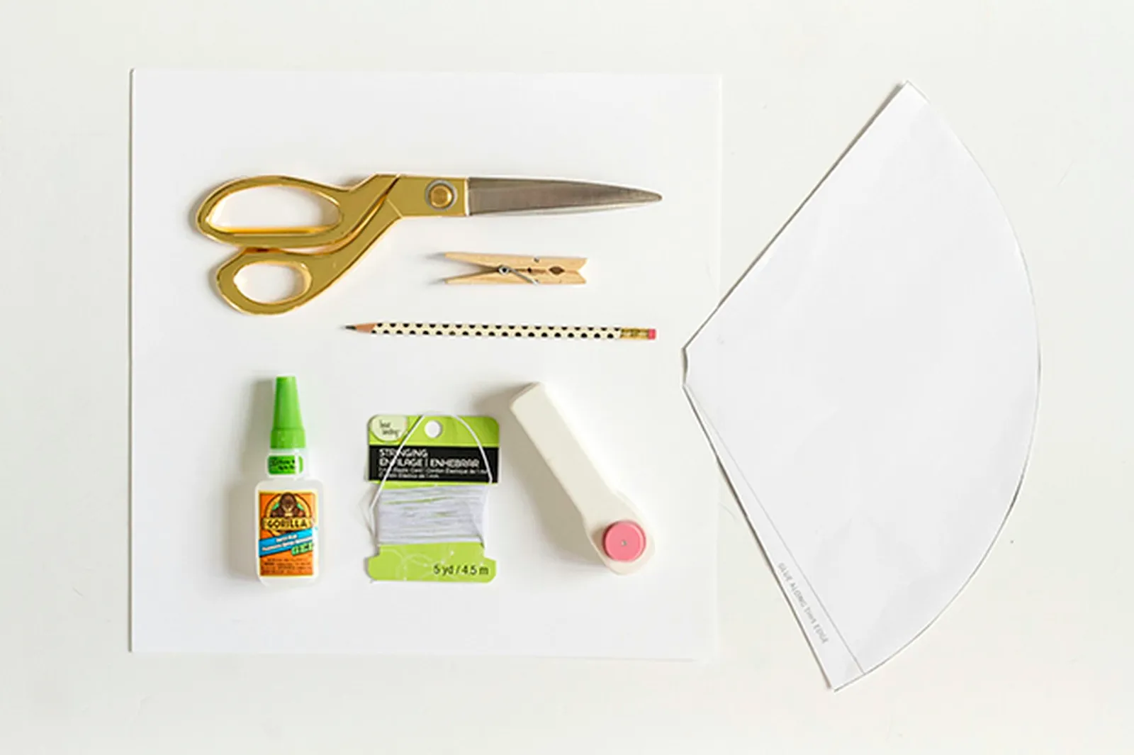 Gather your supplies to make the paper hats.