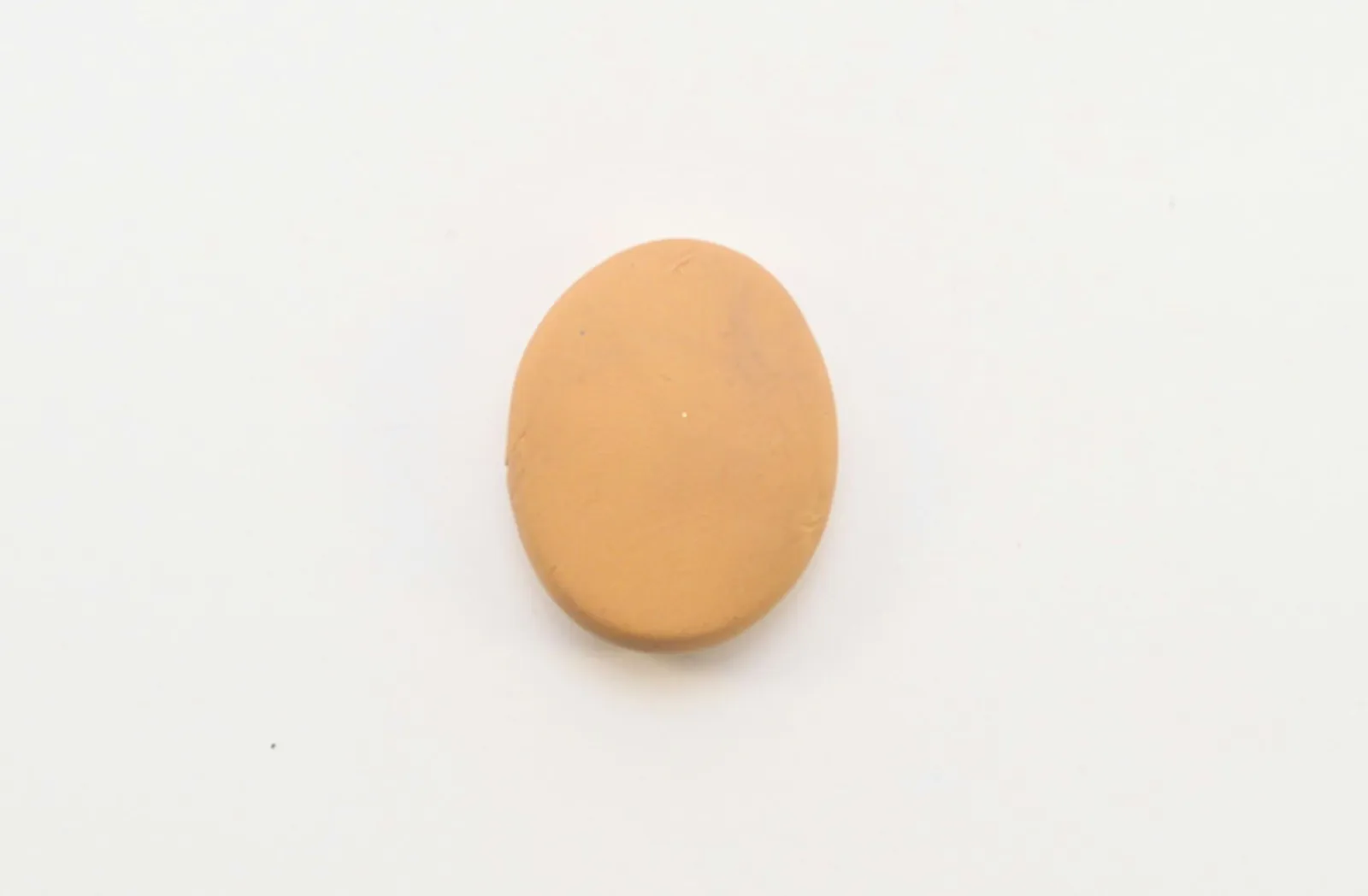 Nail polish bottles, thick markers and cans of spray paint can all be used to flatten your clay
