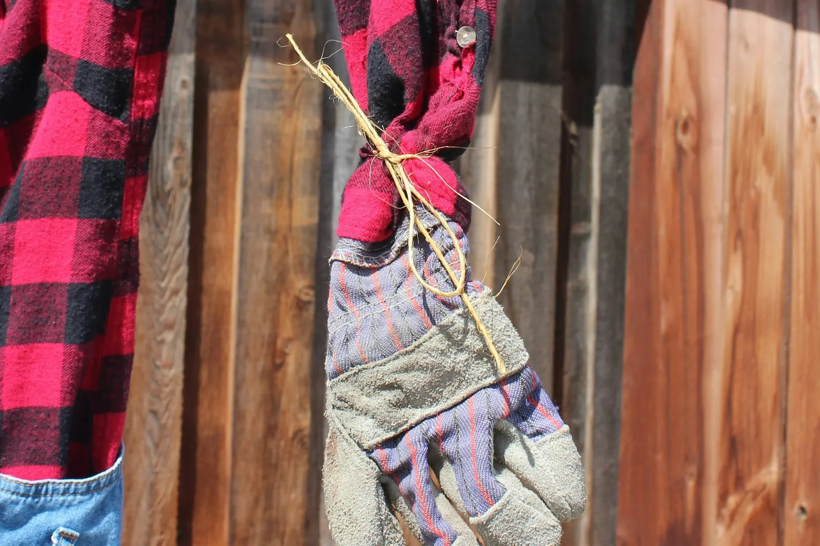 Gloves are secured with twine
