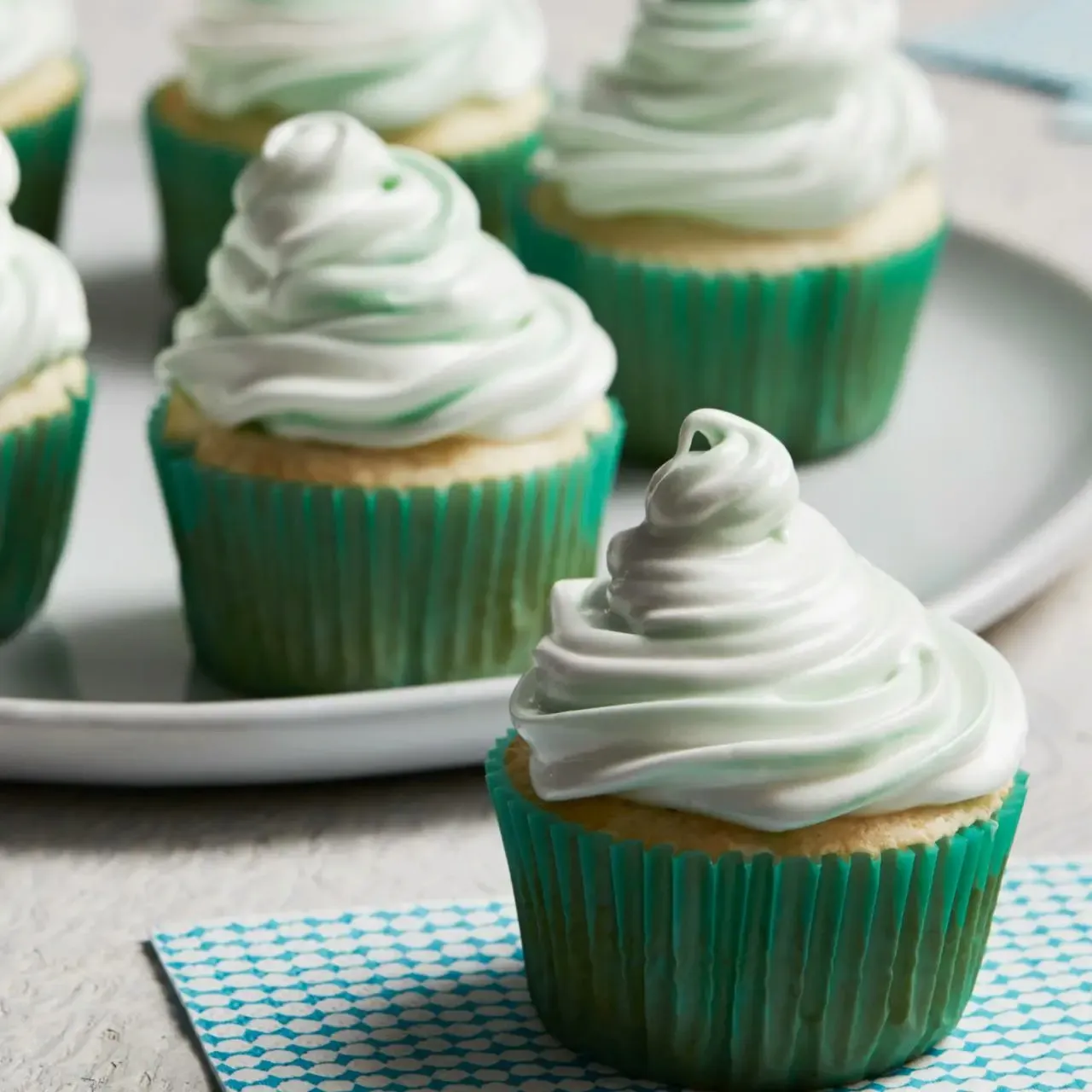 White Cupcakes with Meringue Frosting