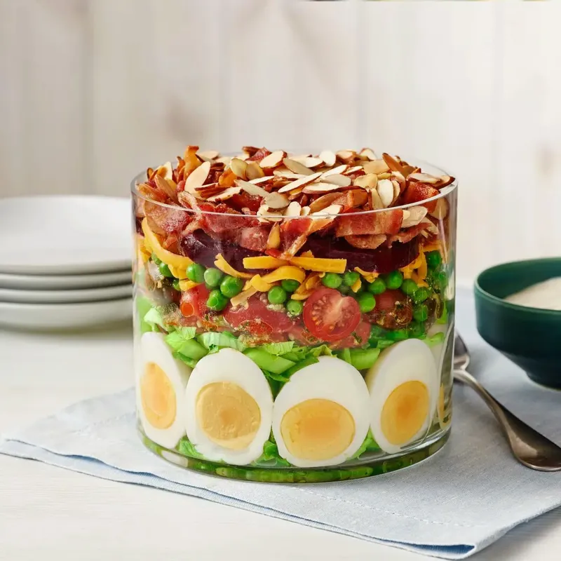 7-Layer Salad with Pine Nut Pesto, Bacon and Roasted Beets with Toasty Almonds